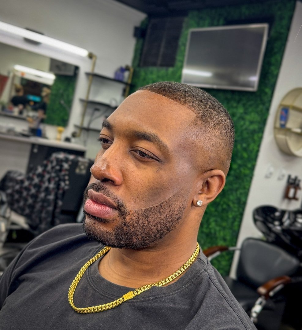 Fresh fade with a lined-up beard